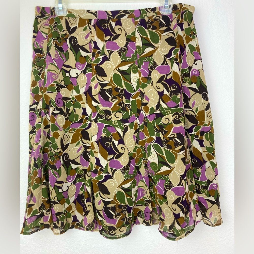 Pretty Floral chiffon skirt in mix of muted, neutrals and brights. Lined.